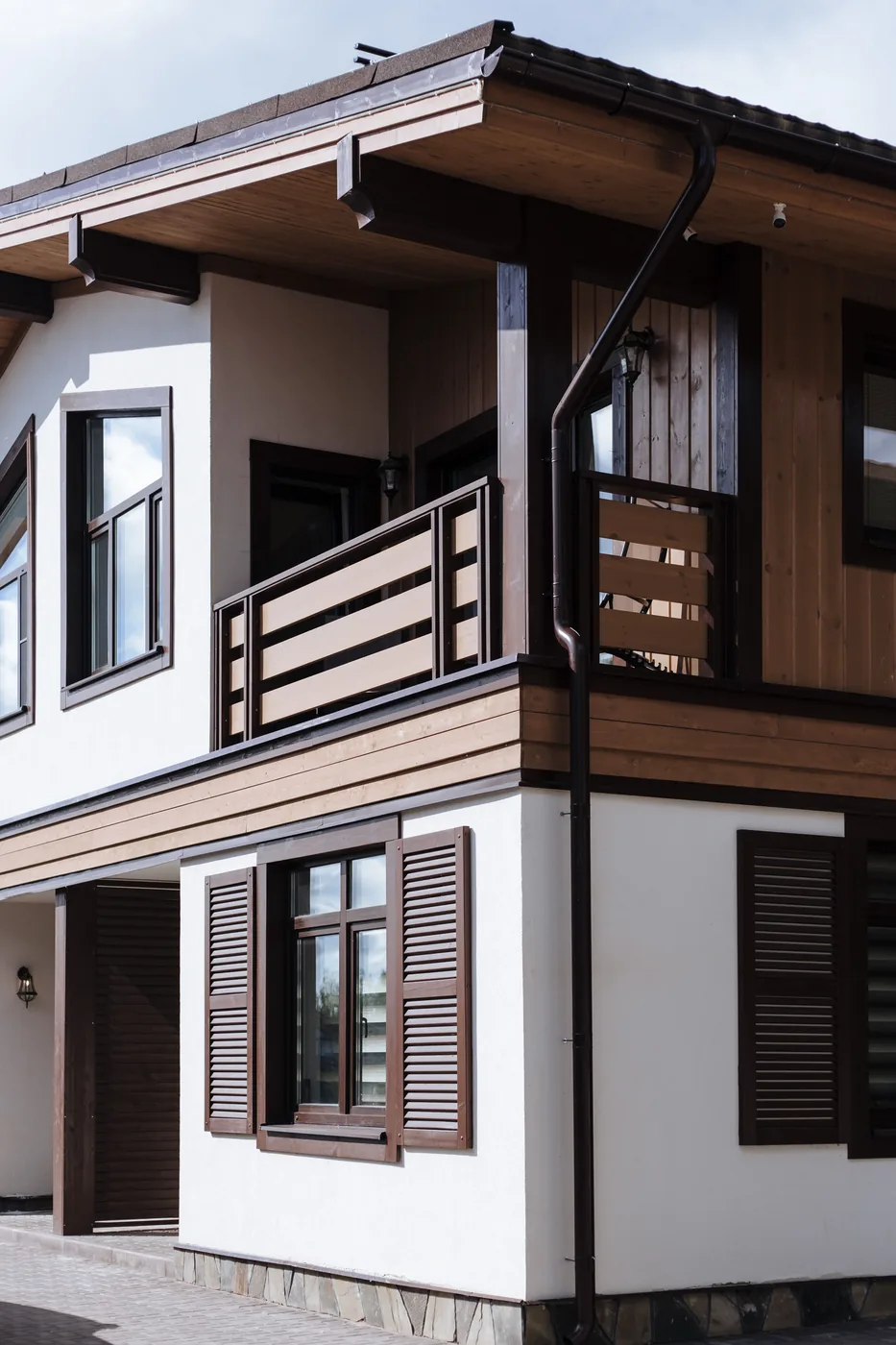 Property manager reviewing a rental unit exterior during a maintenance walkthrough